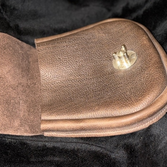 Brown Leather Backpack with Classic Design and Flap Closure